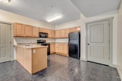 This bright, well-maintained main-floor condo in central Provo