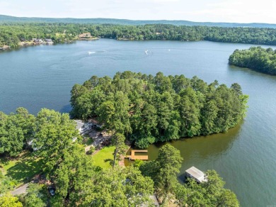 Come see this once-in-a-lifetime property perched on the shores