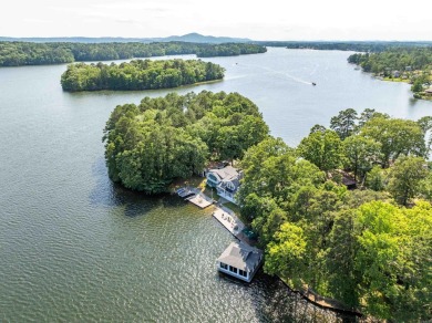 Come see this once-in-a-lifetime property perched on the shores