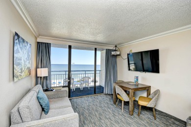 Experience coastal living at its finest in this beautifully