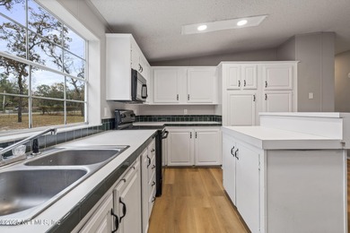 Country living in a quiet tucked away neighborhood, minutes to