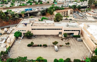 PRIME LOCATION OFFICE BUILDING ON A HIGH TRAFFIC CORNER (between