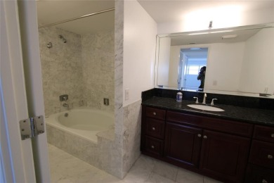 THIS SPACIOUS CORNER PENTHOUSE FEELS LIKE A HOME. SITTING ON A