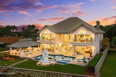 Nestled along the scenic Halifax River corridor this Ormond