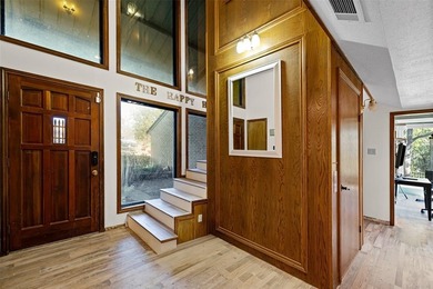 Discover exceptional lakeside living in this spacious 3,660 sq