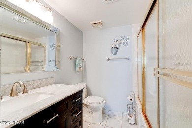 Wake up to the breathtaking ocean views in this light and bright