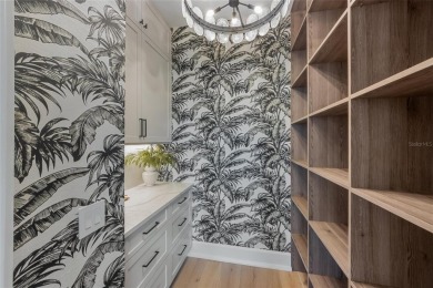 Experience the charm of Anna Maria Island with this NEWLY