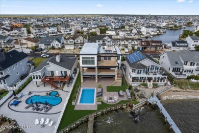 Discover the pinnacle of coastal living in this stunning