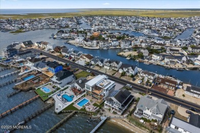 Discover the pinnacle of coastal living in this stunning