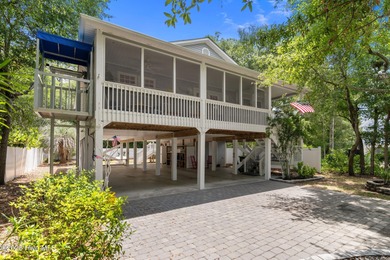 Welcome to your dream home on Oak Island! This delightful, well
