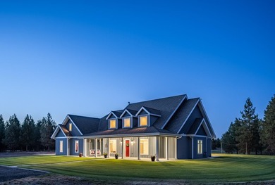 Private, serene country living with a secure gated access on 10