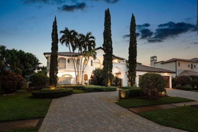 Experience breathtaking long lake views from this grand estate