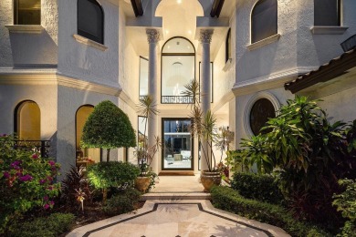 Experience breathtaking long lake views from this grand estate