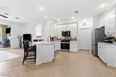 WOW! Take a look at this LOVELY attached villa pool home, with a