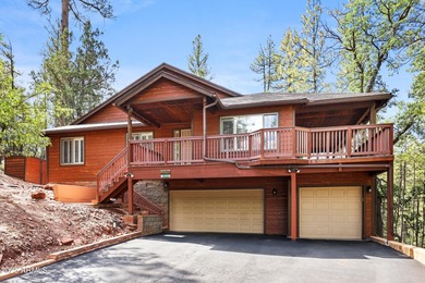 This beautiful cabin is tucked inside the gated community of