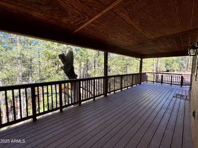 This beautiful cabin is tucked inside the gated community of
