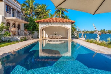 Perfectly nestled in the estates of Palm Island, a Mediterranean