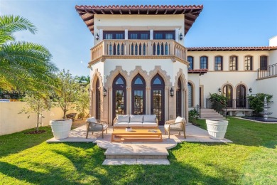 Perfectly nestled in the estates of Palm Island, a Mediterranean