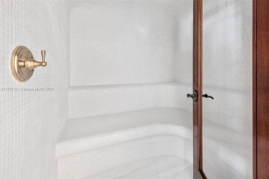 Perfectly nestled in the estates of Palm Island, a Mediterranean