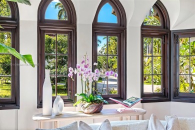 Perfectly nestled in the estates of Palm Island, a Mediterranean