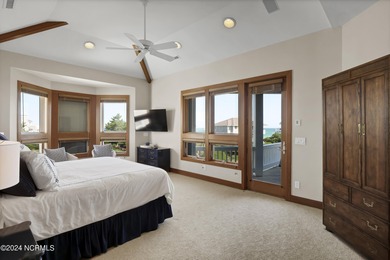 This is a beautifully maintained four-bedroom, five-bathroom