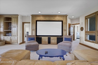 This is a beautifully maintained four-bedroom, five-bathroom