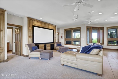 This is a beautifully maintained four-bedroom, five-bathroom