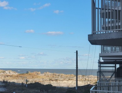 Experience beachfront living at its finest! This well maintained