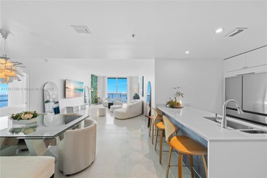 CORNER PENTHOUSE WITH DIRECT BAYFRONT AND SUNSET VIEWS AT