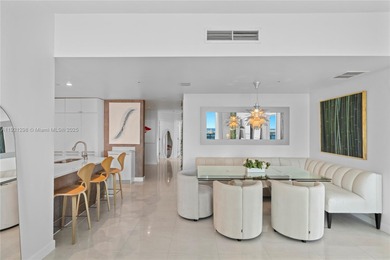 CORNER PENTHOUSE WITH DIRECT BAYFRONT AND SUNSET VIEWS AT