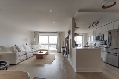 Rarely available top-floor gem in the sought-after Washington