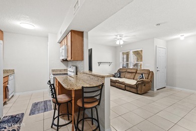 First-floor, wheelchair-accessible unit with a spacious foyer