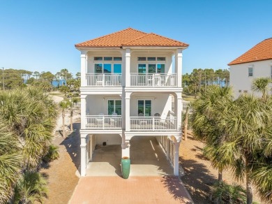 *Belle Isle* is a 4 bedroom 4 1/2 bath Mediterranean style home