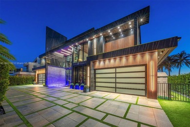 Welcome to 733 Middle River Drive in the gated community of