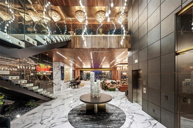 Welcome to 733 Middle River Drive in the gated community of