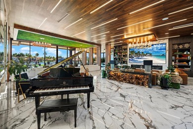 Welcome to 733 Middle River Drive in the gated community of