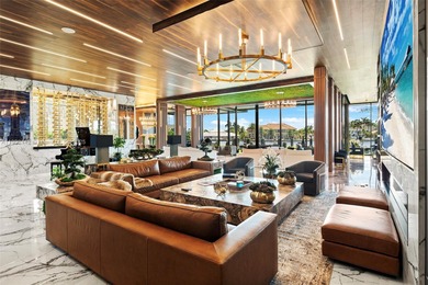 Welcome to 733 Middle River Drive in the gated community of