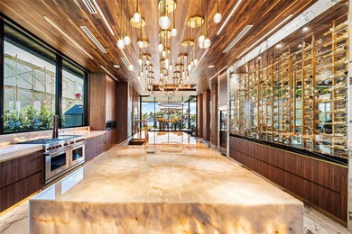 Welcome to 733 Middle River Drive in the gated community of