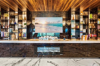 Welcome to 733 Middle River Drive in the gated community of