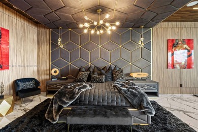 Welcome to 733 Middle River Drive in the gated community of