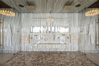 Welcome to 733 Middle River Drive in the gated community of