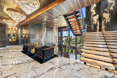 Welcome to 733 Middle River Drive in the gated community of