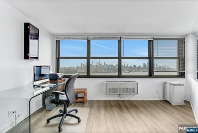 Experience luxury high-rise living at its finest in this