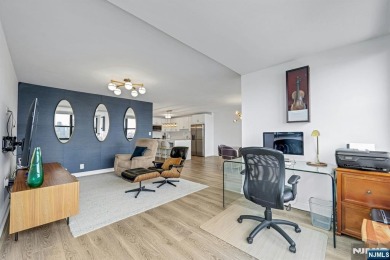 Experience luxury high-rise living at its finest in this