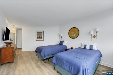 Experience luxury high-rise living at its finest in this