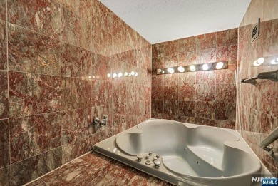 Experience luxury high-rise living at its finest in this