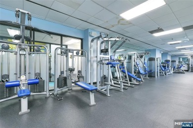 Experience luxury high-rise living at its finest in this