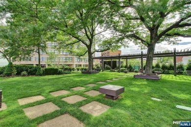 Experience luxury high-rise living at its finest in this