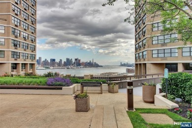 Experience luxury high-rise living at its finest in this