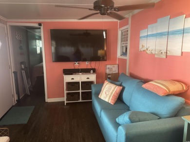 Beachside Living Made Easy with a motivated seller! Discover